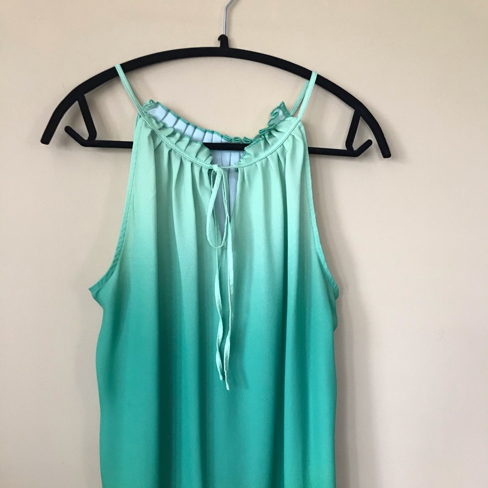 Ombre green shirt.